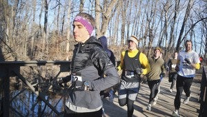 Kyle Dammen runs during the Kevin and Kyle Dammen Ski Race Saturday morning, which due to lack of snow was turned into run. Kyle's twin brother passed away just about seven months ago and before that the brothers began and organized the annual cross-country race.