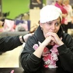 Barb Nelson tears up as she talks about her latest battle with cancer Thursday at the Riverland Community College cosmetology department. Nelson found out just Wednesday that she had Stage 4 cancer and was at the cosmetology department supporting their Paint the Town Pink event by getting a manicure.