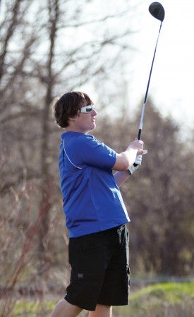 Lyle-Pacelli's Spencer Holtorf tees off at Meadow Greens.