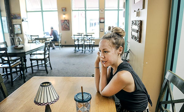 Shannon Frid-Rubin in the Coffee House on Main, downtown Austin. Frid-Rubin is a member of the band Cloud Cult which will play at this year's Austin ArtWorks Festival. Eric Johnson/photodesk@austindailyherald.com