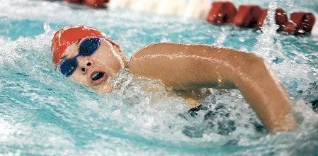 Austin's Paige Sunderman swims in the 200 freestyle during the Packers' dual with Rochester Century Thursday night. Eric Johnson/photodesk@austindailyherald.com