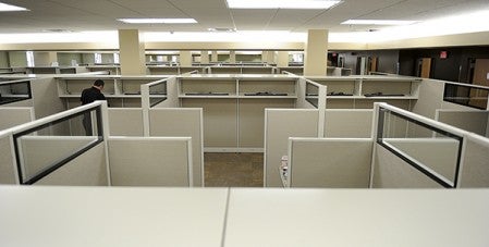 Cubicles are stacked on top of cubicles in the new location of Health and Human Services. 