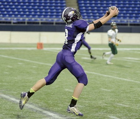 Grand Meadow's Michael Stejskal hauls in a 30-yard pass in the first quarter against Kittson County Central in the Minnesota State Football Nine-Man semifinals last sesaon at Mall of America Field in Minneapolis. Herald File Photo