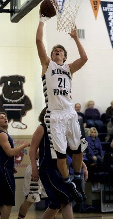 Blooming Prairie's John Rumpza finishes a layup in Grand Meadow Monday. -- Rocky Hulne/sports@austindailyherald.com