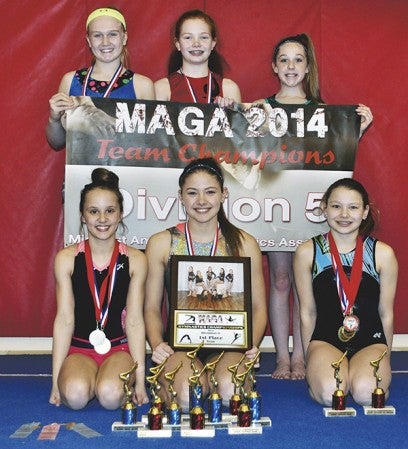 The YMCA 'Guardians' gymnastics team took first at the MAGA State meet this season. The team includes: back row (left to right): Madisyn Busker, Morgan Raymond and Jordan DeLaMater; front row: Elyse Hebrink, Kelsey Hackenmiller and Samantha Sheldon. Not pictured: Marnie Reese. -- Rocky Hulne/sports@austindailyherald.com