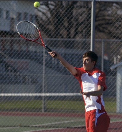 Austin's Jeremy Olmsted competes in a No. 2 singles match against Blue Earth in Paulson Courts Monday. -- Rocky Hulne/sports@austindailyherald.com