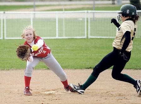 Austin's Abby Bickler covers second on a throw as Rochester Mayo's Laura Henderson pulls into the base Thursday night at Todd Park. Eric Johnson/photodesk@austindailyherald.com