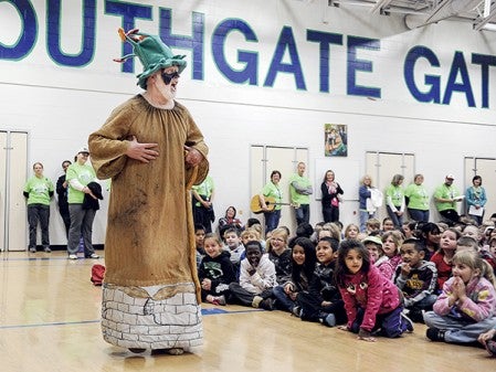 Larry Dolphin of the Jay C. Hormel Nature is the Spirit of the Earth for the kids of Southgate Elementary Friday morning. Eric Johnson/photodesk@austindailyherald.com