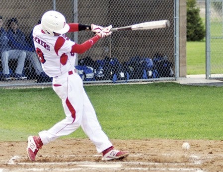 Austin's Dylan Gasner hits a ground ball for the Packers against Owatonna in Dick Seltz Field Tuesday. -- Rocky Hulne/sports@austindailyherald.com