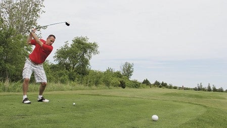 Tom Klapperick tees off during the tournament. Jason Schoonover/jason.schoonover@austindailyherald.com