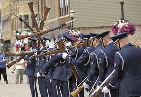 The United States Air Force Honor Guard Drill Team performs on Austin’s Main Street Tuesday afternoon. 