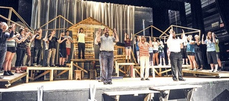 The cast of Summerset Theatre's "Fiddler on the Roof" performs the song "Tradition" during rehearsel Tuesday night at Frank W. Bridges Theatre. Eric Johnson/photodesk@austindailyherald.com