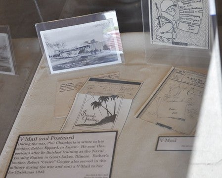 A display showcases letters and postcards sent during WWII.