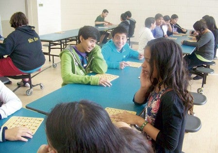 Students play Bingo at the I.J. Hollton Intermediate School during a school-wide carnival to wrap up the summer school student recognition Photos provided