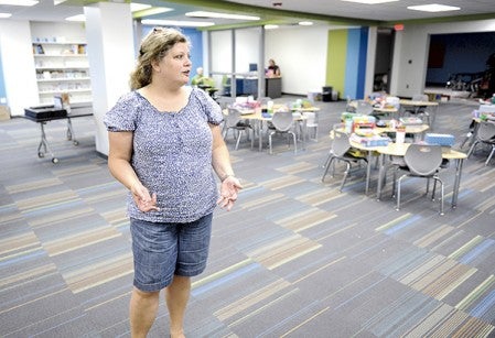 Karla Caroll, Southgate Elementary’s Pi Academy instructor talks about the upcoming school year while showing off the nearly finished renovations Friday. Eric Johnson/photodesk@austindailyherald.com