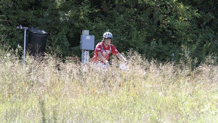 Sam Woodhouse competes in a cycling competition at Buck Hill on Sunday. It was the first competition for Austin’s cycling team.  Photos provided