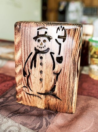 An example of the ornate wooden boxes made by Mary’s husband Dennis. Eric Johnson/photodesk@austindailyherald.com