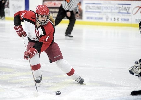 Austin's Chloe Summerfield skates in for what would be Austin's first score of the game against Albert Lea in the first period Thursday night at Riverside Arena. Eric Johnson/photodesk@austindailyherald.com