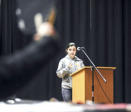 Ellis Middle School eighth-grader Hannah Mead looks up to find she spelled her word right during the spelling bee at Ellis Middle School Thursday. 