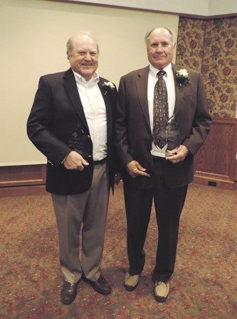 John (left) and Ted receive the Hall of Honor Award from Pacelli Catholic Schools Saturday night.  Photo provided