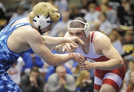 Austin's Kole Igou wrestlers for the Packers in the quarterfinals at the Section 1AAA individual meet at Mayo Civic Center in Rochester. — Micah Bader/Albert Lea Tribune