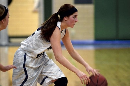 Grand Meado's Rachel Oehlke handles the ball in Pacelli Gym Monday. Rocky Hulne/sports@austindailyherald.com