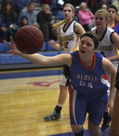 Southland's Kaysie Allen saves a loose ball in a 61-37 loss to PEM in Adams Thursday. -- Rocky Hulne/sports@austindailyherald.com