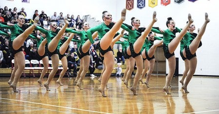 Members of the Austin Packers Dance Team compete Saturday in the High Kick portion of the Section 1A Dance Meet in Packer Gym. Eric Johnson/photodesk@austindailyherald.com