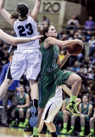 Lyle-Pacelli's Sarah Holtz goes up for a lay-up in traffic against Fillmore Central during the second half of the Section 1A championship Friday night at Mayo Civic Center in Rochester. Eric Johnson/photodesk@austindailyherald.com