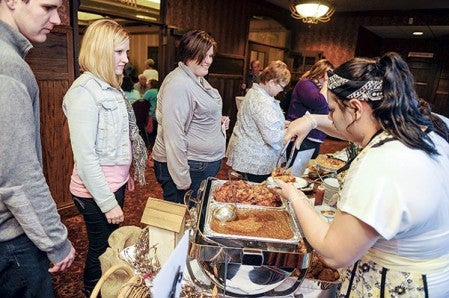 People begin lining up for tasting during the annual Foodie Throwdown.