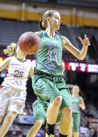 Lyle-Pacelli’s Madison Truckenmiller looks inside during the first half of the Minnesota State Girls Basketball Class A semifinals Friday against Ada-Borup at Williams Arena. Eric Johnson/photodesk@austindailyherald.com