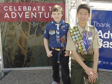 Sam Hagan (left) and Anthony Thomas are pictured together five years ago at a convention at the Mall of America. Meeting Thomas was a big influence for Sam and helped drive him to become an Eagle Scout. Photo provided