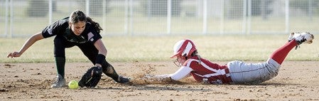 Austin's Sydney Murphy slides safely into second during the second inning against Faribault Friday afternoon at Todd Park. Eric Johnson/photodesk@austindailyherald.com