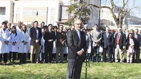 Gary Ray, chairman of the Hormel Foundation, explains the Foundation's role in a new apartment complex for Hormel Institute researchers Monday during a groundbreaking ceremony. Foundation and Institute officials announced the 42-unit Science Park Housing complex will begin construction in May and be ready for occupancy at the beginning of 2016. Trey Mewes/trey.mewes@austindailyherald.com