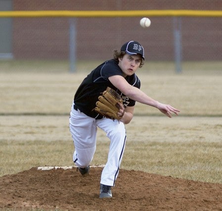 Blooming Prairie's Sam Swenson fires a pitch against Faribault Bethlehem Academy in Blooming Prairie Thursday. Rocky Hulne/sports@austindailyherald.com