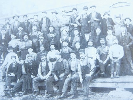 An early employee photo that includes a young Howard Snyder. Snyder is fourth from the left in the second row from the bottom.  Photo provided