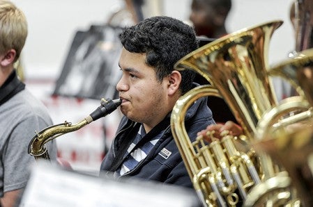 Tenor saxophone player Maycol Quetzecua rehearses with the Austin High School band during rehearsal for the upcoming Band Blast. Eric Johnson/photodesk@austindailyherald.com