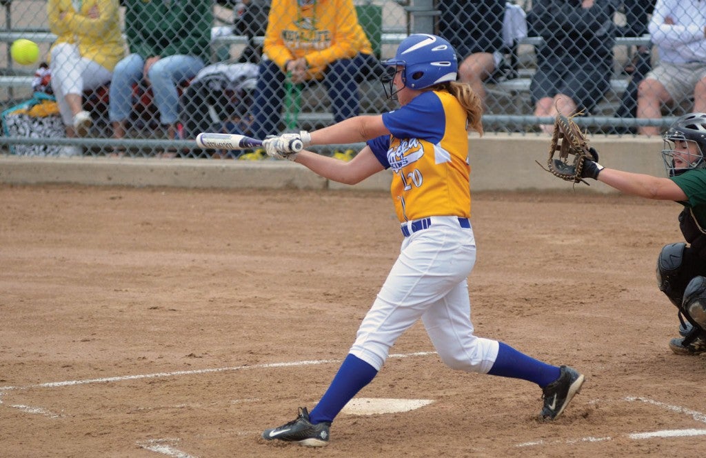 Hayfield's Kyal Heydt connects on a first inning RBI double against New Life Academy in the Minnesota Class A state softball tournament in North Mankato Thursday. Rocky Hulne/sports@austindailyherald.com