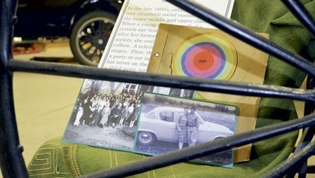 Several photos and memorabilia sit in the Rahilly Building at the Mower County Fairgrounds, waiting to be placed for the new exhibit on courting at the Mower County Historical Society. 