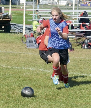 Chloe Sheehan advances the ball in practice for the Austin girls soccer team Thursday. The Packers will open their season against Fairmont in Art Hass Stadium 7 p.m. Thursday. Rocky Hulne/sports@austindailyherald.com