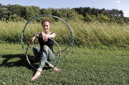 Rochelle Perleberg has found not only an entertainment in hula-hooping but a awy to stay in shape as well. Eric Johnson/photodesk@austindailyherald.com