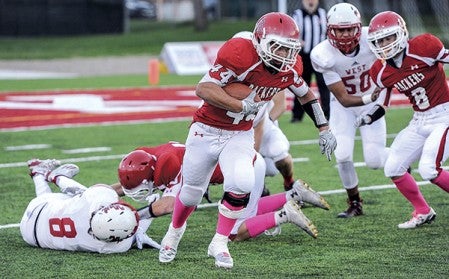 Austin’s Jon Gallagher busts off a big kick return against Mankato West in the first quarter Friday night at Art Hass Stadium. Eric Johnson/photodesk@austindailyherald.com