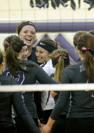 The Grand Meadow volleyball team celebrates a win over LeRoy-Ostrander in Grand Meadow Monday. Rocky Hulne/sports@austindailyherald.com