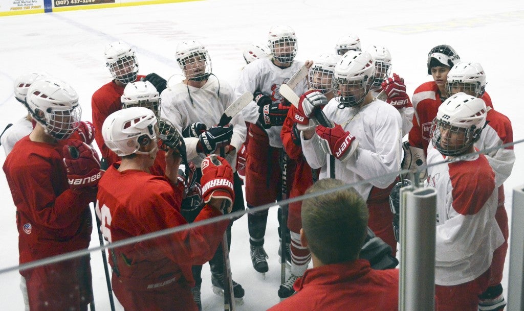 The Austin boys hockey team met after practice in Riverside Arena Thursday. The Packers open their season at Mankato West 7:30 p.m. Saturday. Rocky Hulne/sports@austindailyherald.com