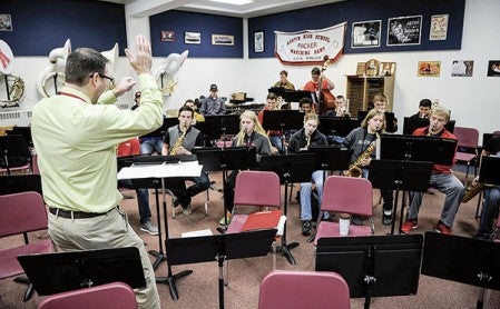 Austin High School band director Bradley Mariska directs the jazz band during a rehearsal Tuesday. Eric Johnson/photodesk@austindailyherald.com