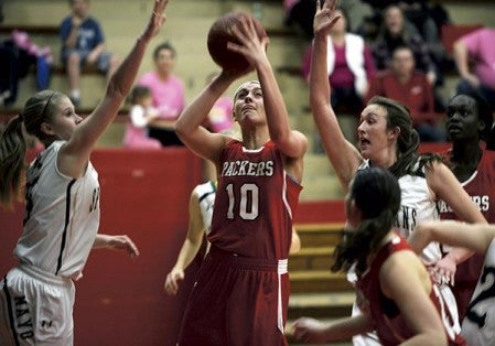 Austin’s Ashley Hawkshead goes up for a shot in traffic against Rochester Mayo in Ove Berven Gym Thursday. Rocky Hulne/sports@austindailyherald.com