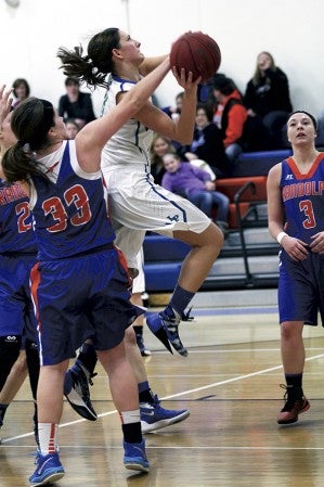 Lyle-Pacelli’s Sarah Holtz takes the ball to the hoop at Randolph Thursday. Photo Provided by Colleen Nelson