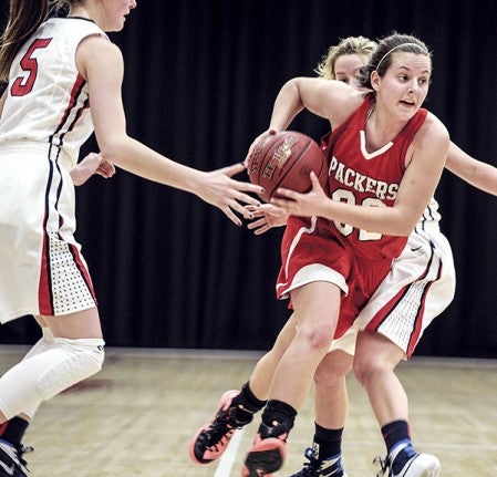 Austin’s Kelsey Sederquest drives to the hoop during the first half against Albert Lea Tuesday night in Ove Berven Gym. Eric Johnson/photodesk@austindailyherald.com