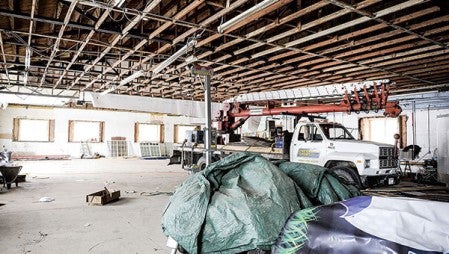 Work remains on the inside of what will be Precision Signs’ new production facility. Eric Johnson/photodesk@austindailyherald.com