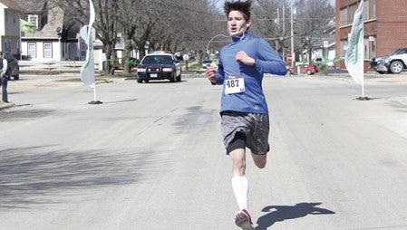 Peter Torkelson finishes the Pacelli Catholic Schools Shamrockin’ Run in first place on Saturday.  -- Photo's  provided